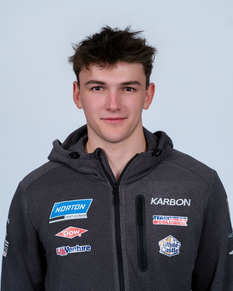 Logan Barnes in his Senior National Team hoodie with sponsor patches